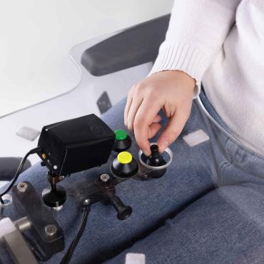 This is a photo of a Micro Joystick mounted in a tabletop