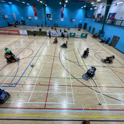 A group of power soccer players in action