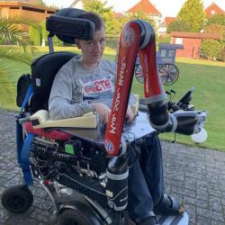 This is a photo of Hendrik in his electric wheelchair
